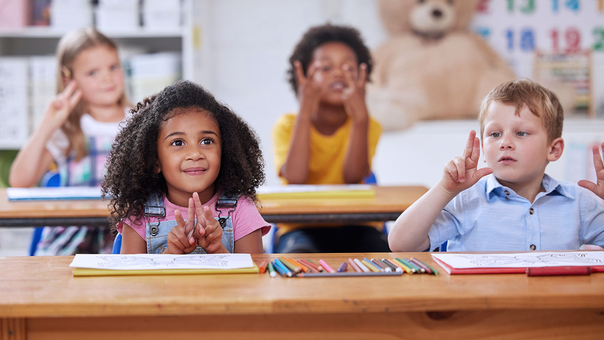 Young children in a math classroom learning. 