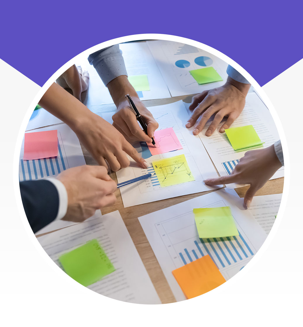 The hands of people working together to solve problems