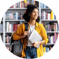 A person carrying a backpack and a computer